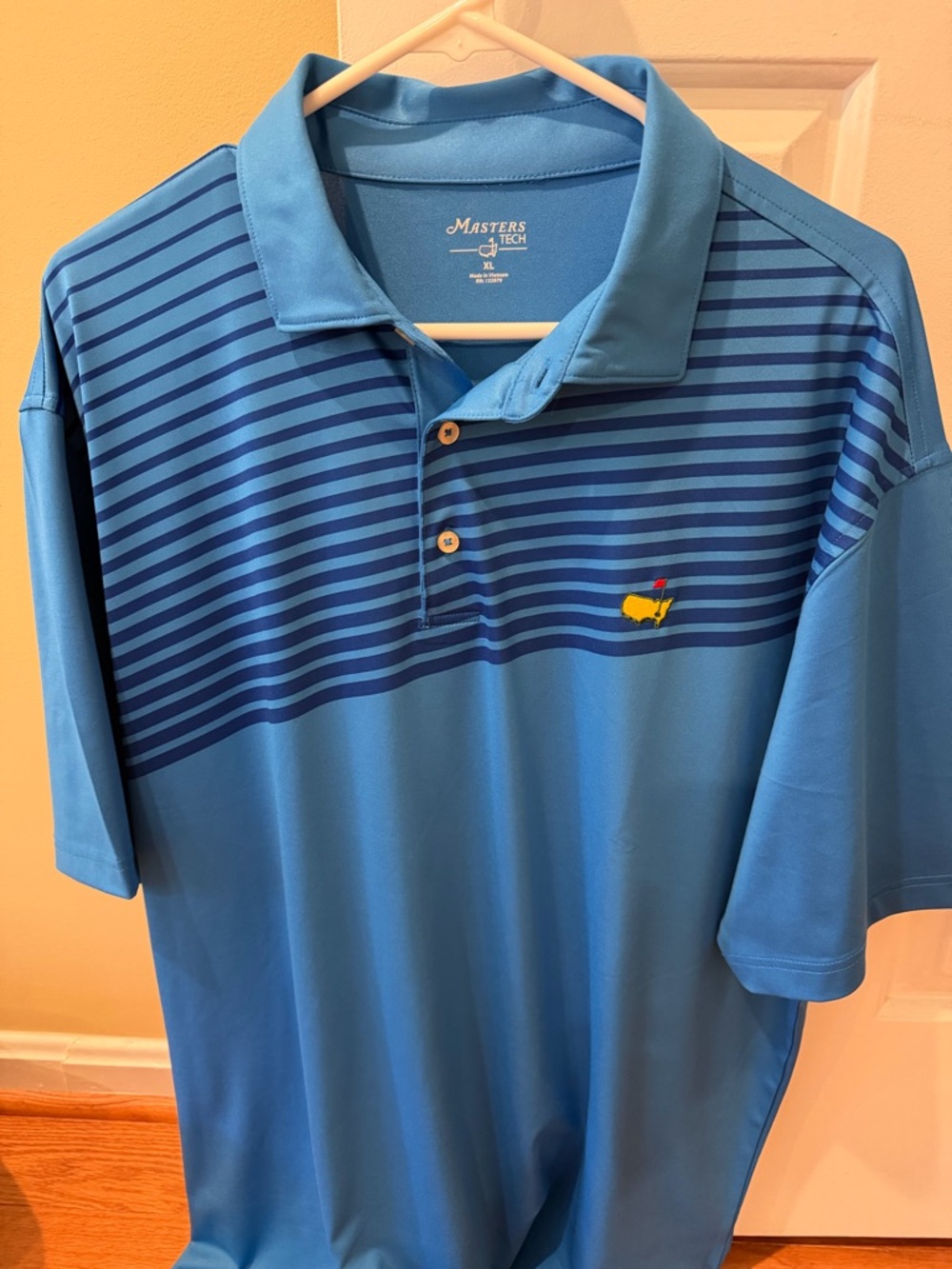 Masters Two-Tone Blue Striped Polo with Yellow Logo